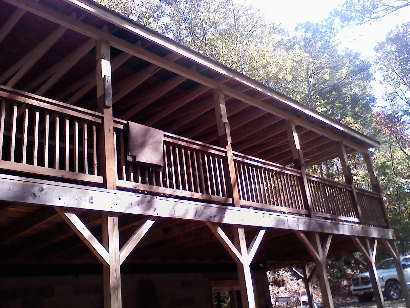 Timber framing under a new elevated porch and deck — Roof Leak Repair in Rensselaerville by Roofing Brothers